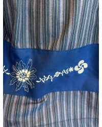 Euskal gona urdina, lauburu eta eguzkilore brodatuarekin